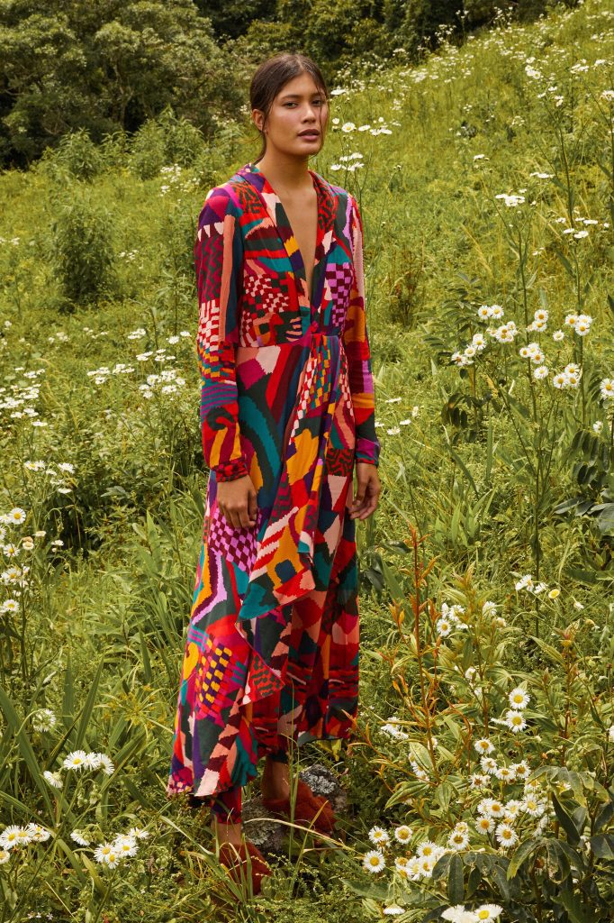 Long sleeve maxi dress in high impact multi coloured abstract patch print. Low v neck line and long sleeves.