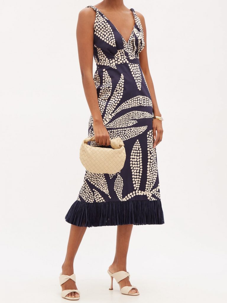 Johanna Ortiz latin inspired midnight blue midi dress with raffia-trimmed hemline and abstract tropical print. sleeveless and shaped to a gathered V-neck from organic cotton.
