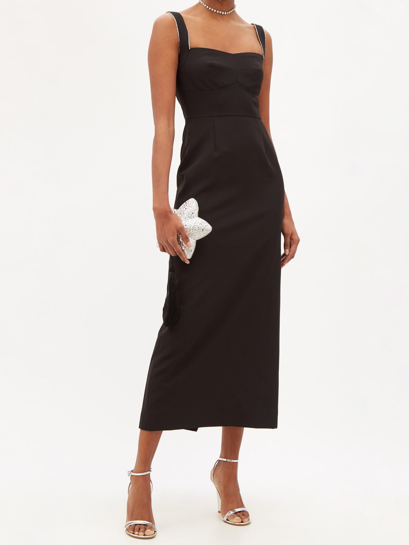 Saloni frames the sweetheart neckline of this black slim fitting Midi dress with crystals along the shoulder straps. Dress features back slit for movement. 