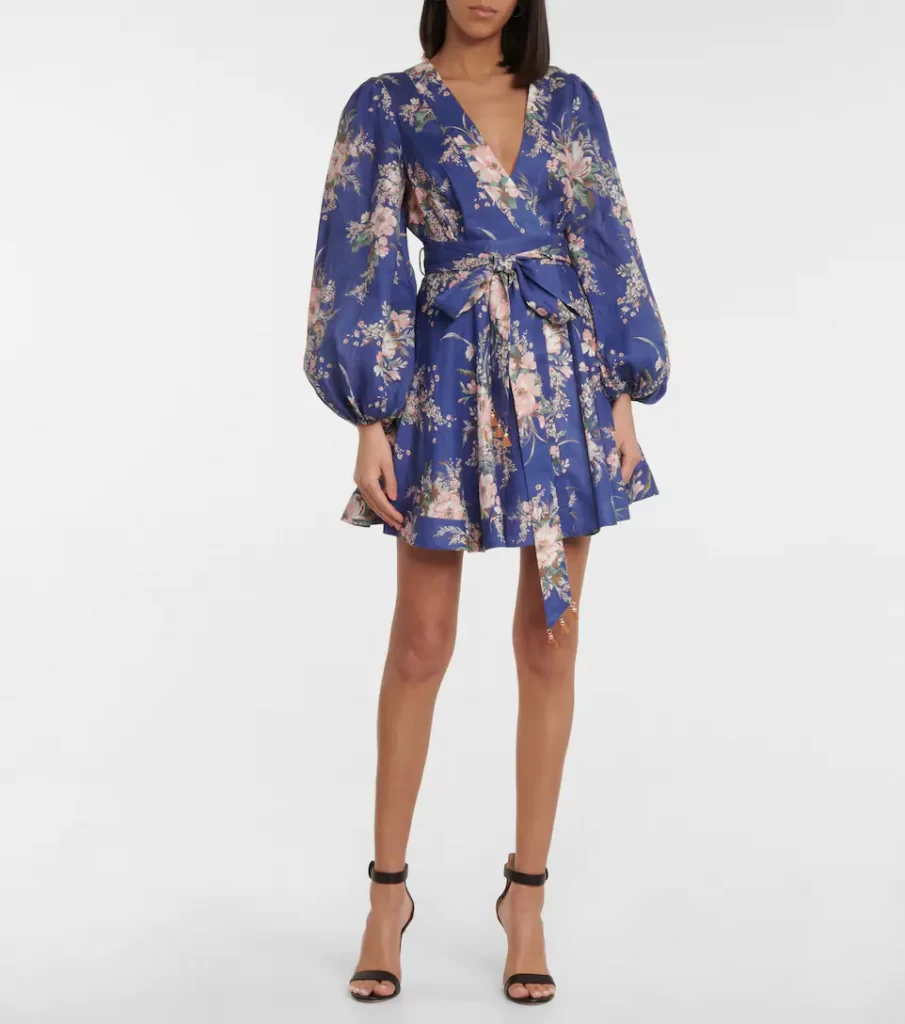 Blue floral linen minidress from Zimmermann with a wrap-effect bust and cinched waist with a self-tie that's tasseled at the tips for a playful finish.