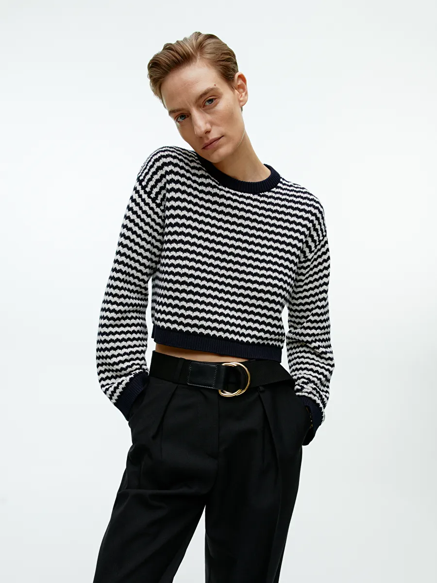 COS Organic Cotton Knitted Flared Ribbed Trousers in Black
