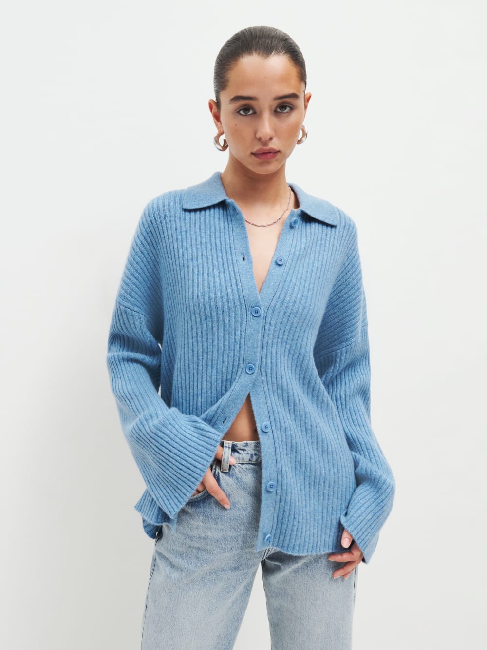 Reformation Fantino cashmere collard cardigan in pale blue with Dropped shoulders, and front buttons.