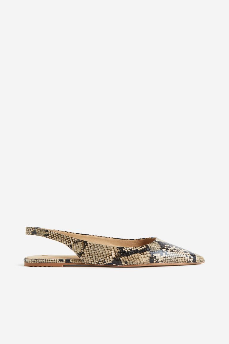 H&M snake print Slingbacks with pointed toes, a narrow ankle strap and soles that are fluted underneath.