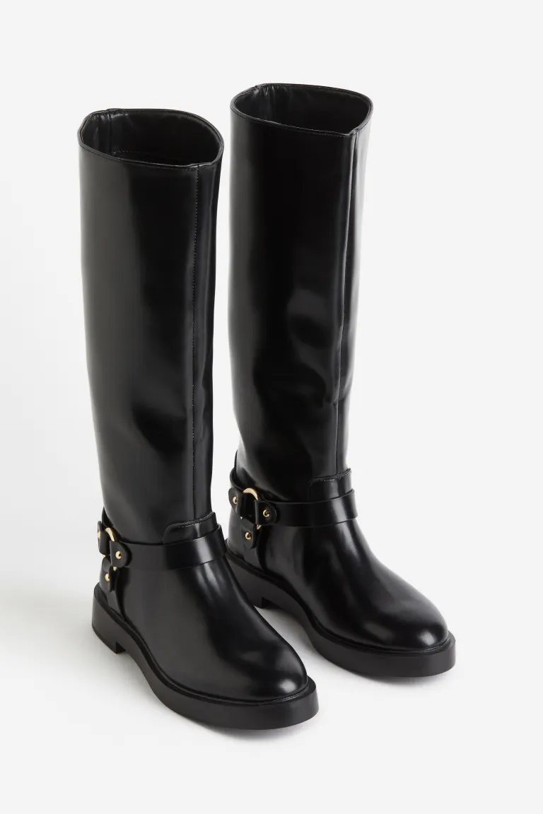 H&M Knee-high biker boots with round toes and decorative tabs around the ankle. Satin linings. Height of soles 2 cm. Heel 3.5 cm.