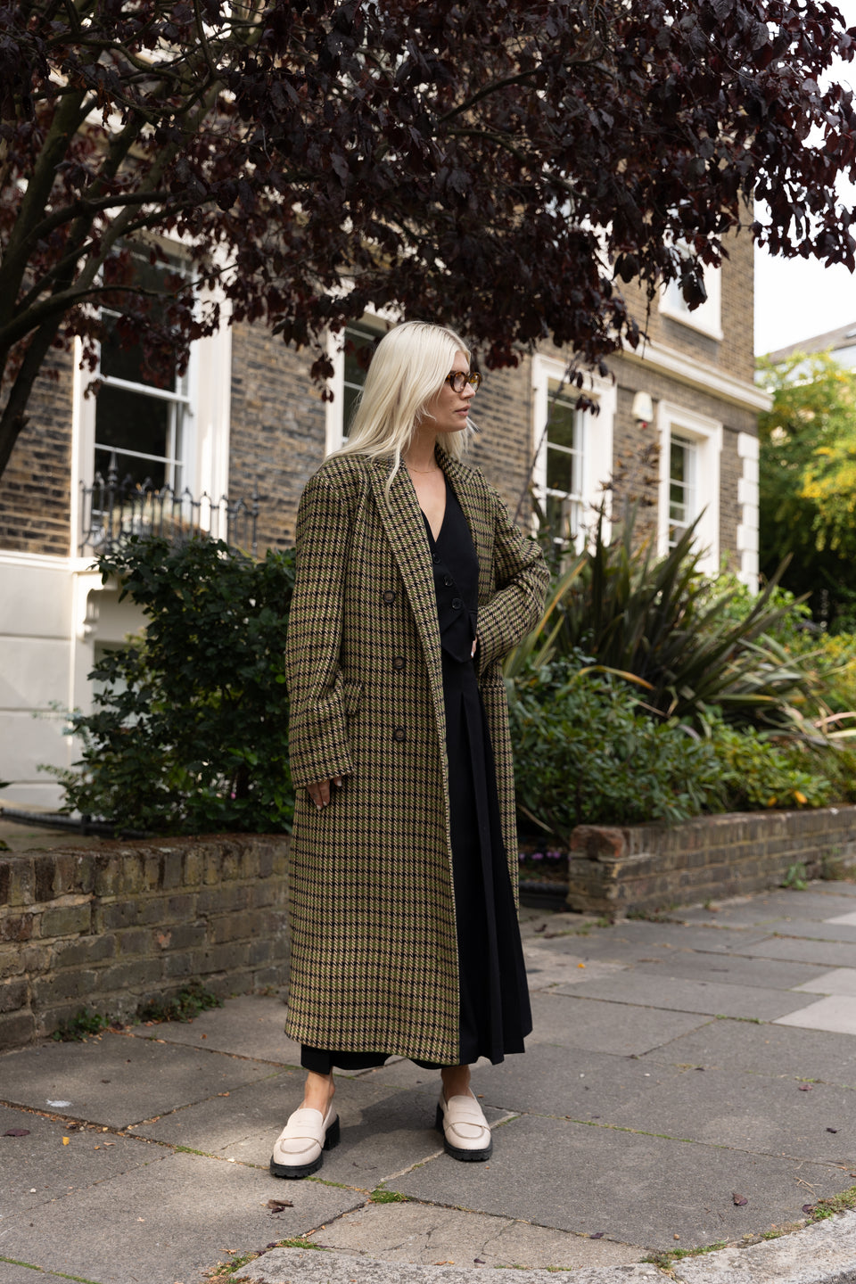 Trending Winter Coats 2023 2024 - Aligne Kennedy coat is Finished in a striking heritage check pattern that features shades of green and brown, it's a statement-making piece that'll add a touch of colour to any outfit. Wear with jeans and a turtleneck for a casual, refined look, or pair with a dress and boots for an elevated take.  Designed for a slightly relaxed, contemporary fit
