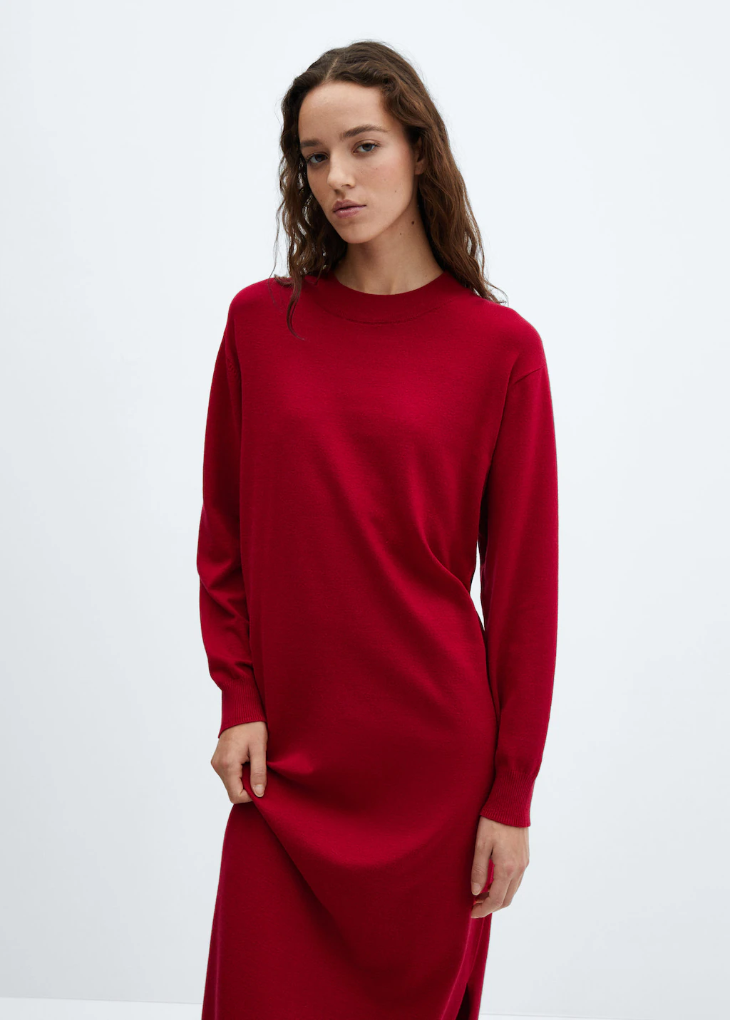 Mango red knit dress in Fine knit fabric. Straight Long design with relaxed fit, Rounded neck & Long sleeves. Side slit hem.
