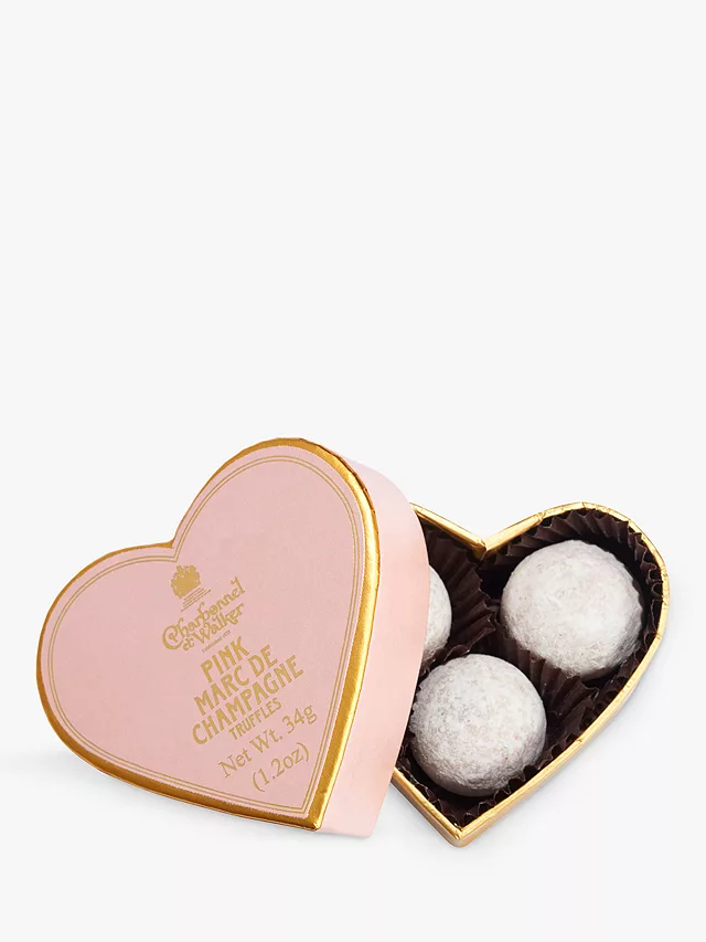 Show someone just how much they mean to you, with this darling pink heart-shaped box containing three Marc de Champagne truffles.