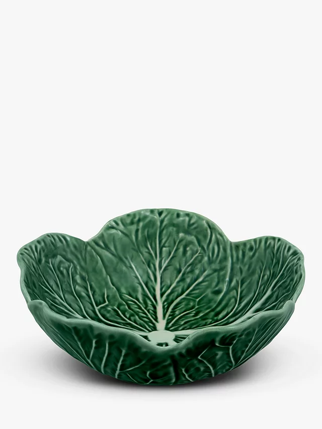 A colourful cabbage-inspired serving bowl from Bordallo Pinheiro. Made of earthenware in Portugal using traditional ceramic manufacturing techniques, the bowl is microwave and dishwasher safe for everyday use.