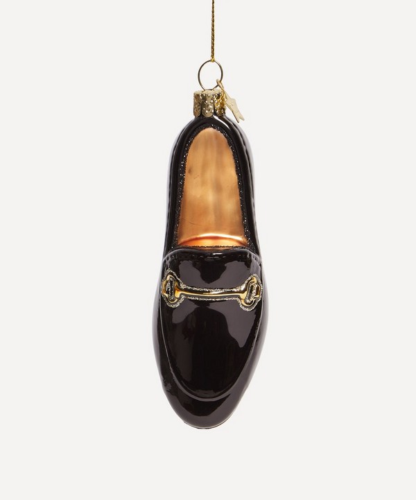 Chic Secret Santa Gift Ideas for every budget in 2023. Liberty's Christmas tree bauble Loafer shape Black finish Glitter and gold tone horse bit detailing Glass style String hanging
