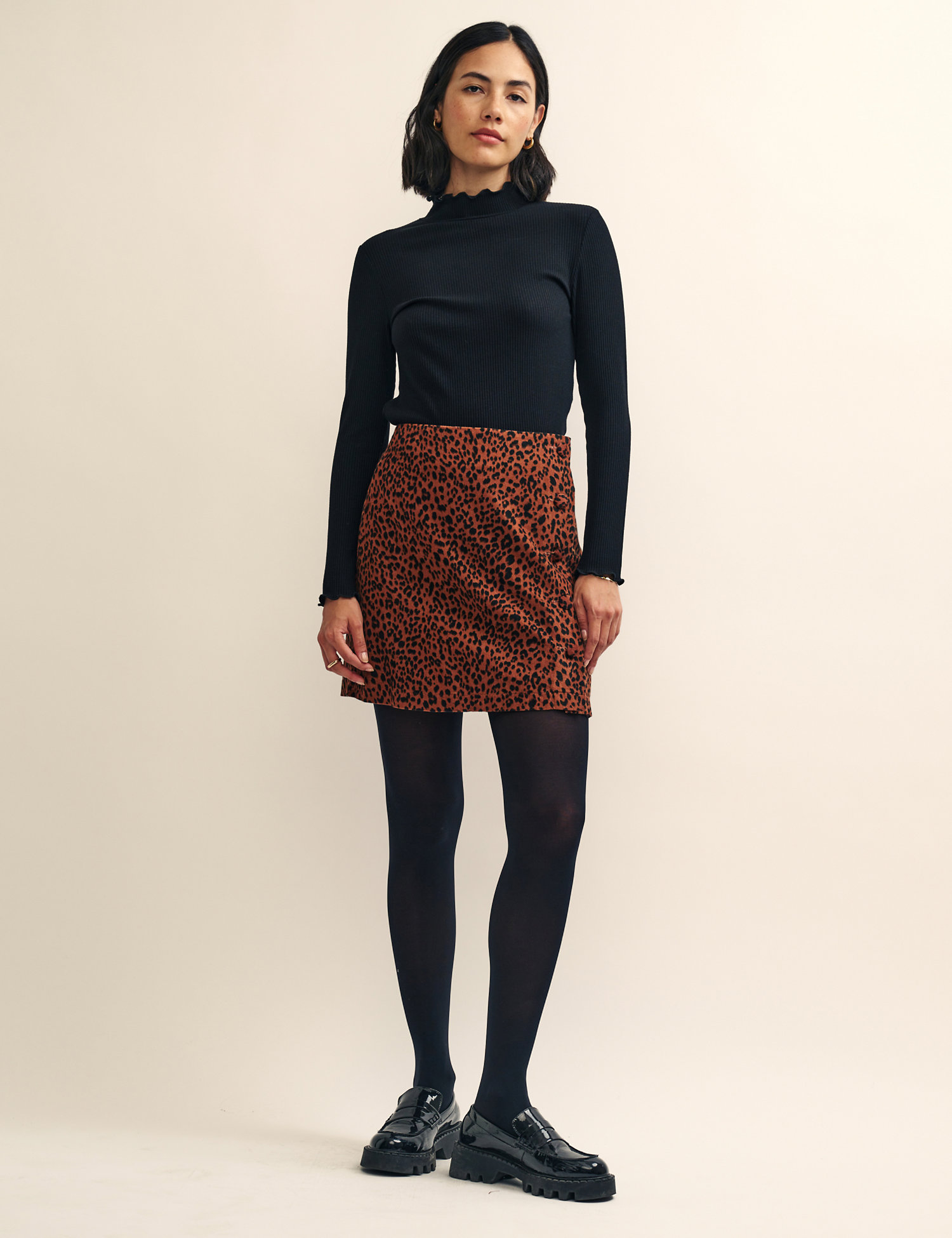 This Nobody's Child mini skirt is crafted from soft organic cotton, with a super fine cord texture. It has a flattering A-line shape that skims your figure and fastens with discreet buttons. The detailed leopard print gives a distinctive finish. Nobody’s Child designs are cut to a form-fitting shape, so if you're looking for a more relaxed fit, we recommend choosing the next size up.


