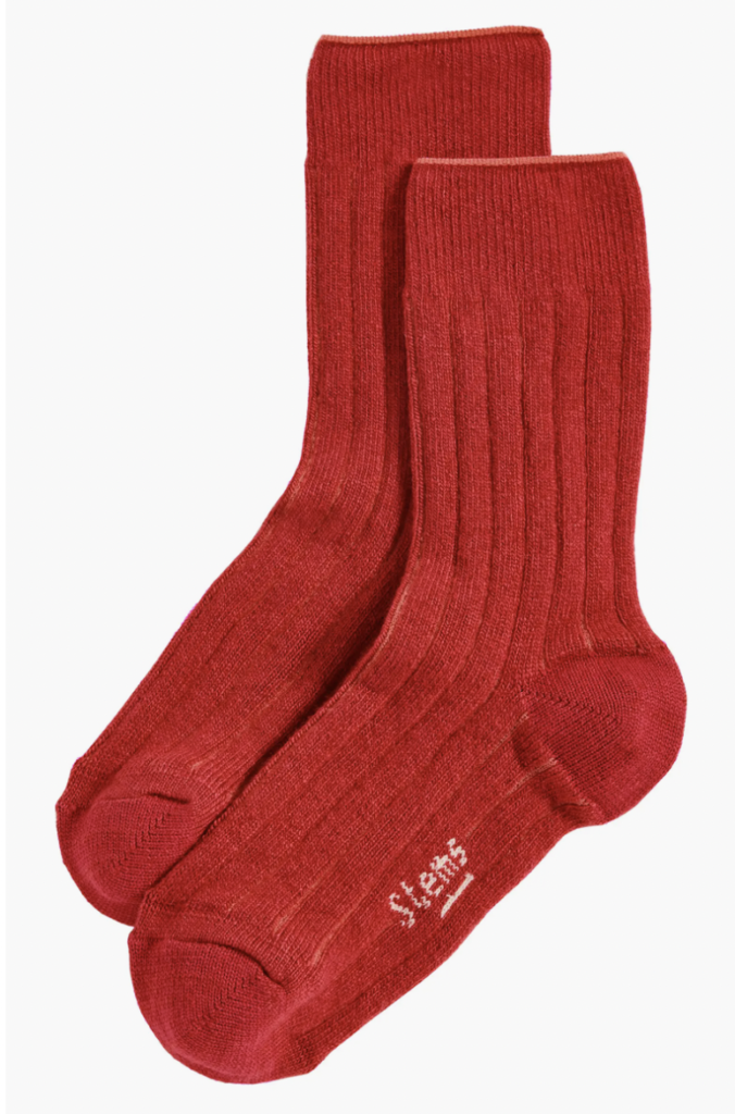 Stems red socks. Extrafine merino wool is blended with a touch of cashmere for luxe comfort that will make these ribbed crew socks the ones you reach for most.