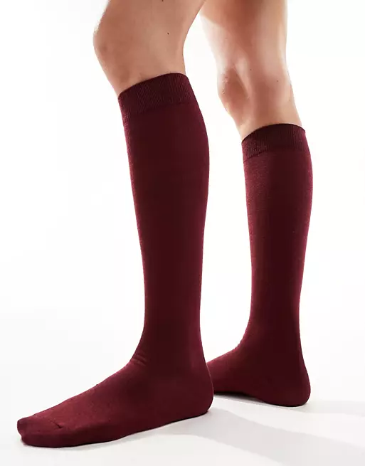 ASOS DESIGN knee high socks in dark red. 